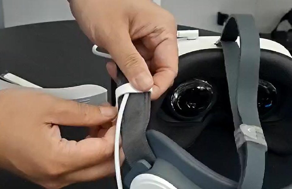 Securing the battery cable along the VR headset strap